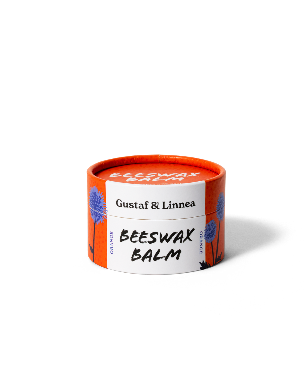 Stängd burk bivaxsalva i apelsinfärgad förpackning från Gustaf & Linnea.