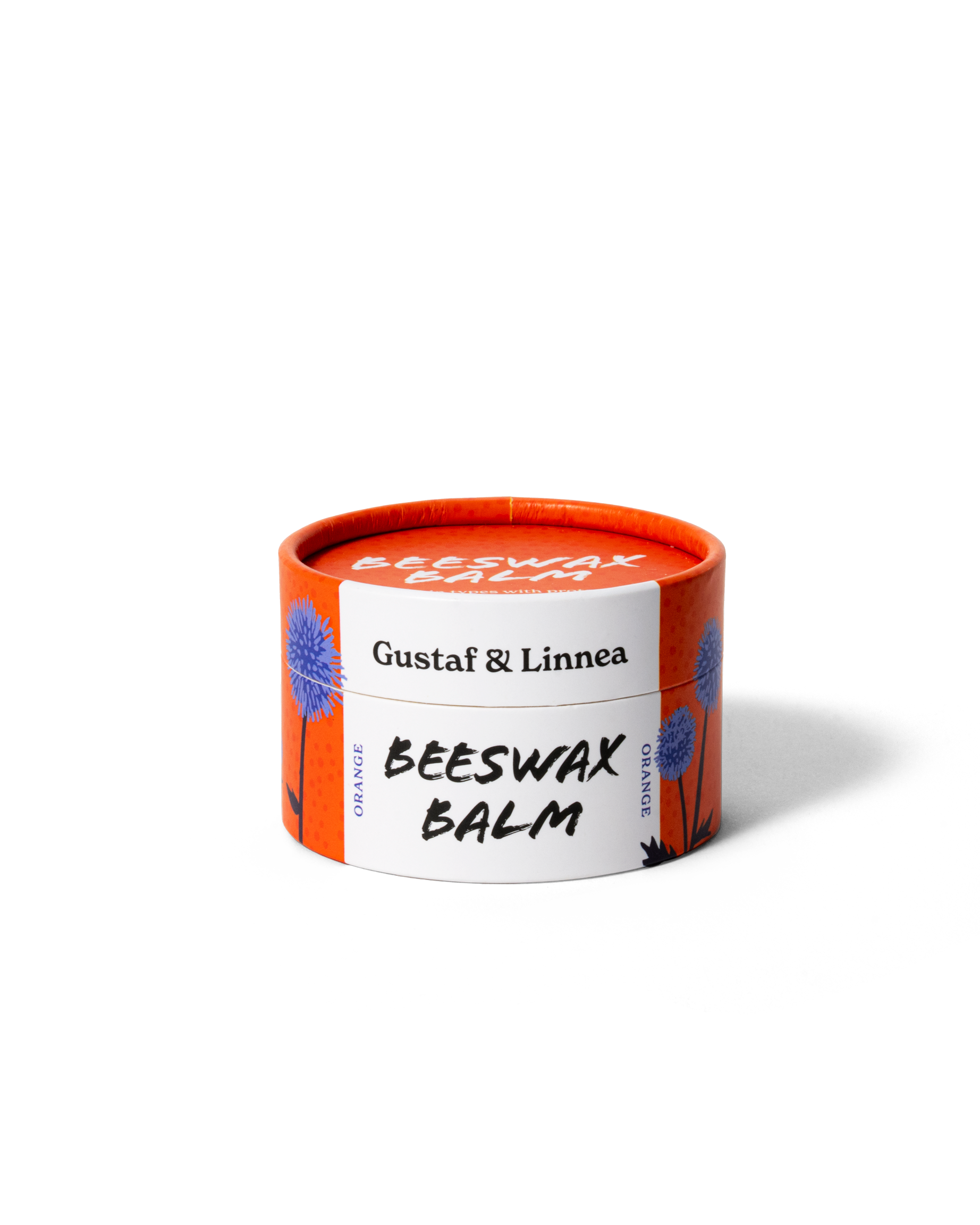 Stängd burk bivaxsalva i apelsinfärgad förpackning från Gustaf & Linnea.