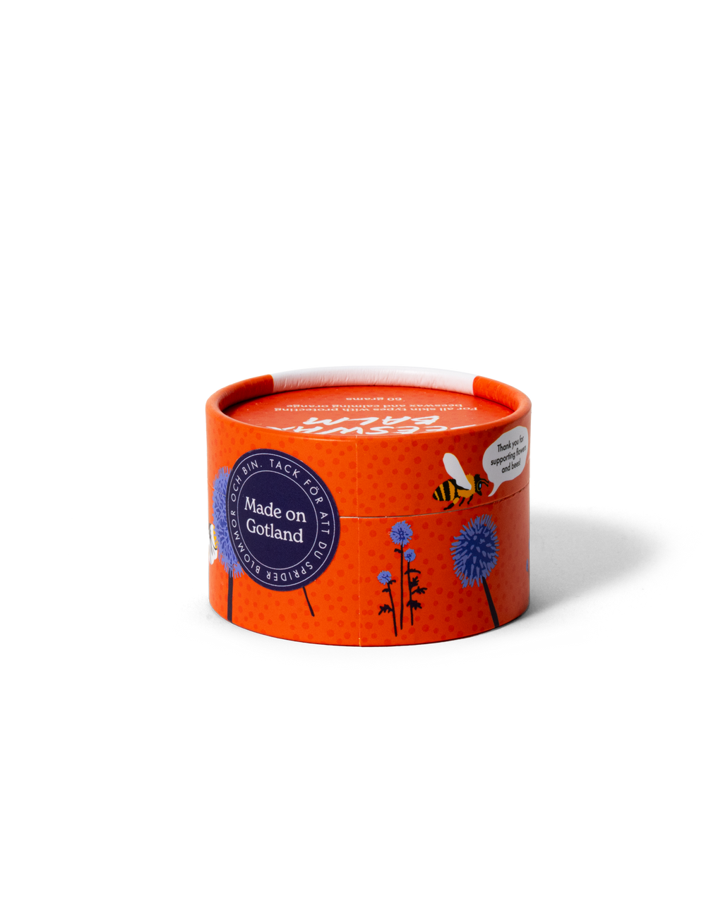 Detaljbild av bivaxsalva i burk, naturlig hudvård med bivax och apelsin