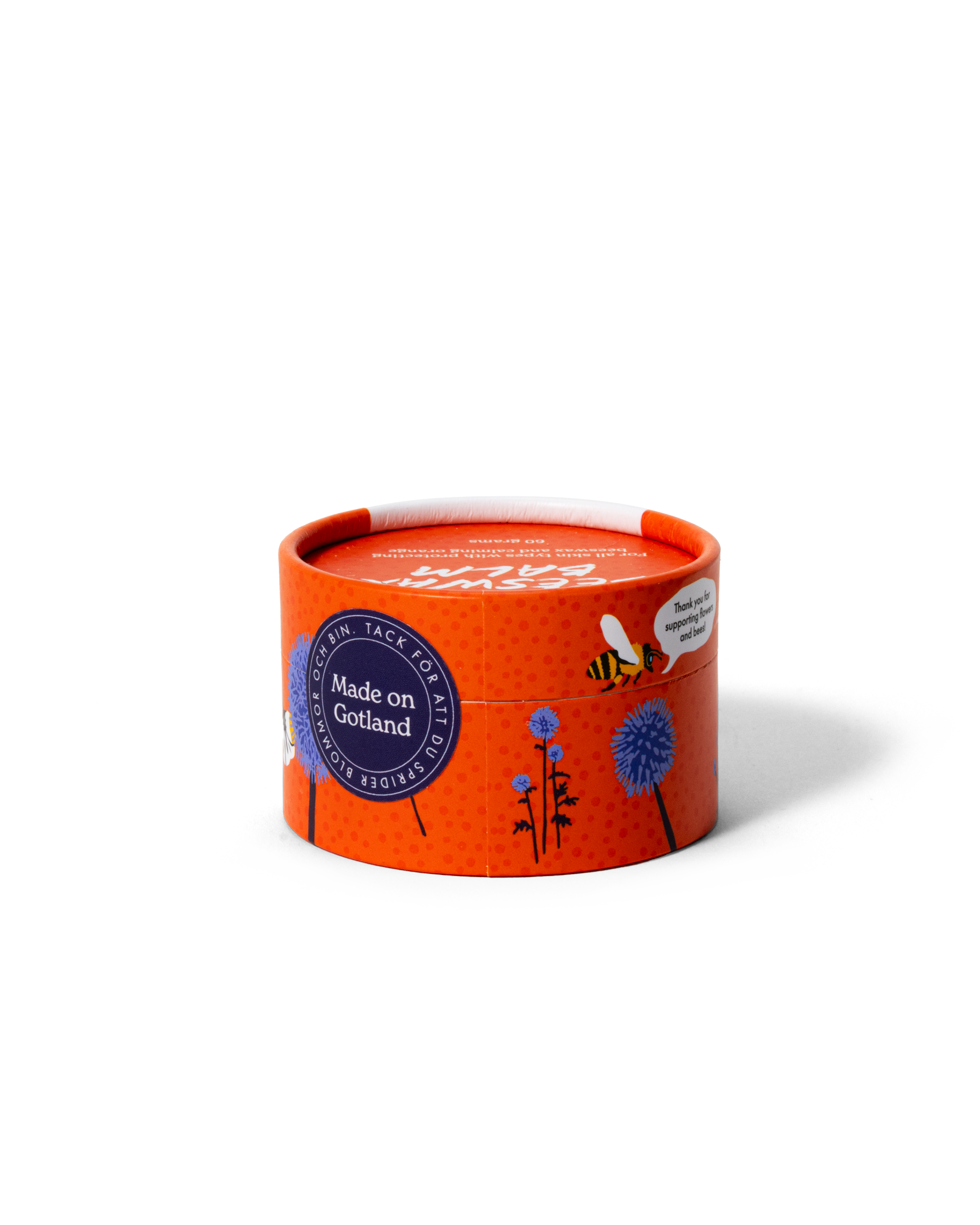 Detaljbild av bivaxsalva i burk, naturlig hudvård med bivax och apelsin