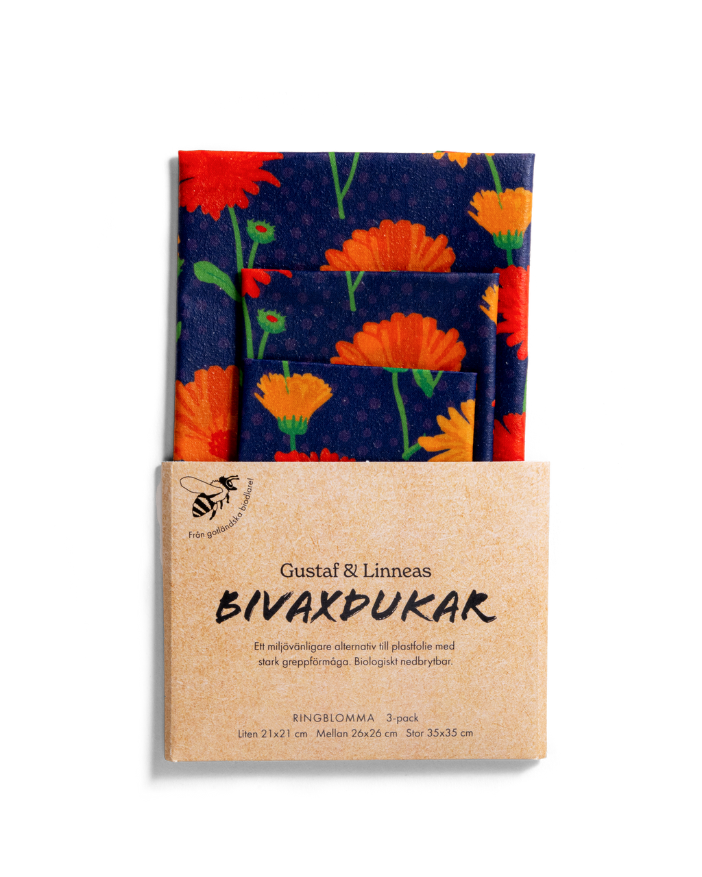 Bivaxdukar med ringblomsmotiv