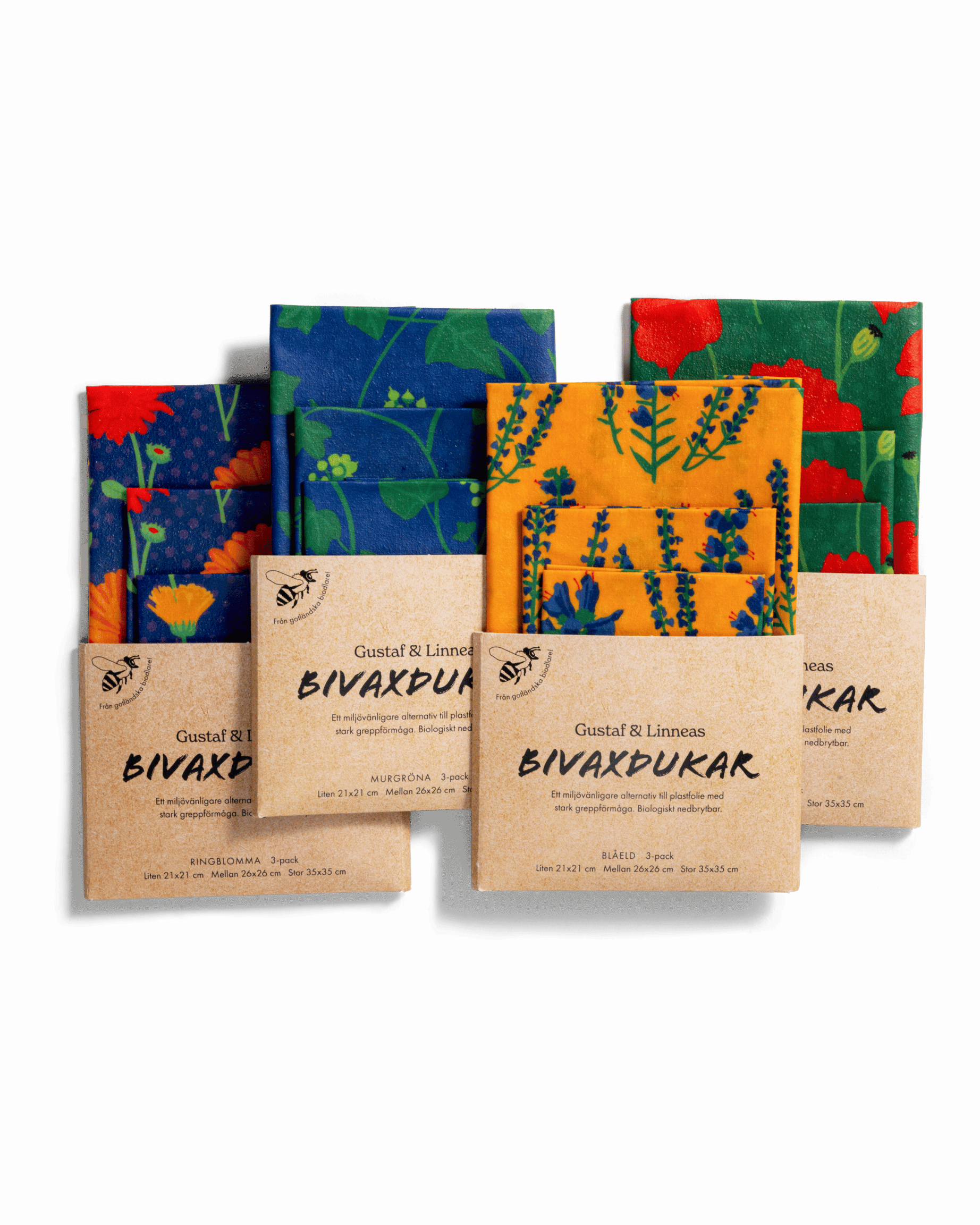 Fyra paket med bivaxdukar från Gustaf & Linnea. Alla paket med motiv av blommor.