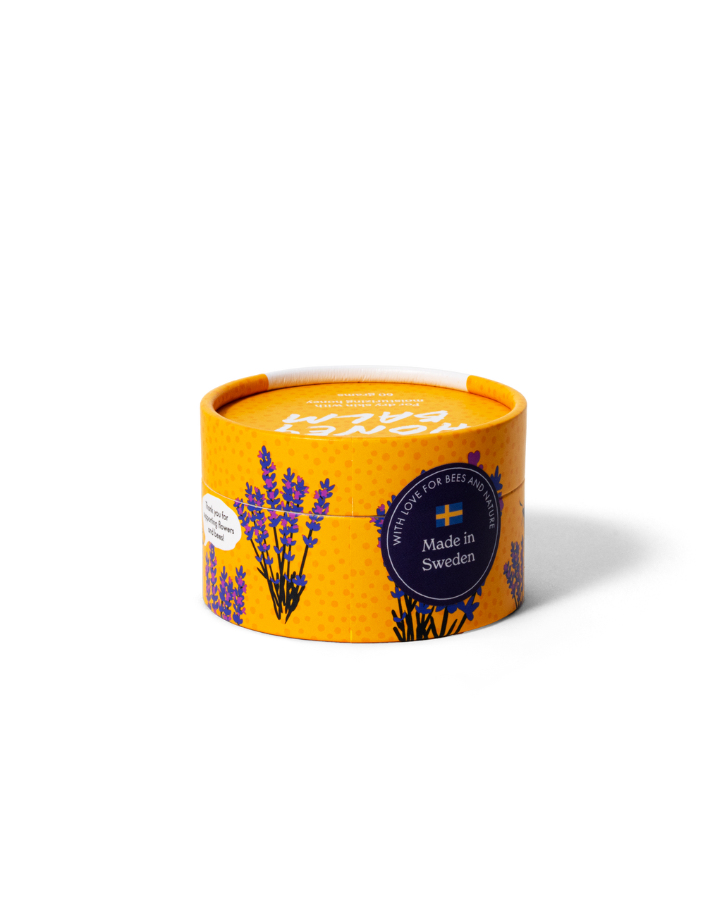 Honey ointment in a round jar from Gustaf & Linnea photographed at an angle
