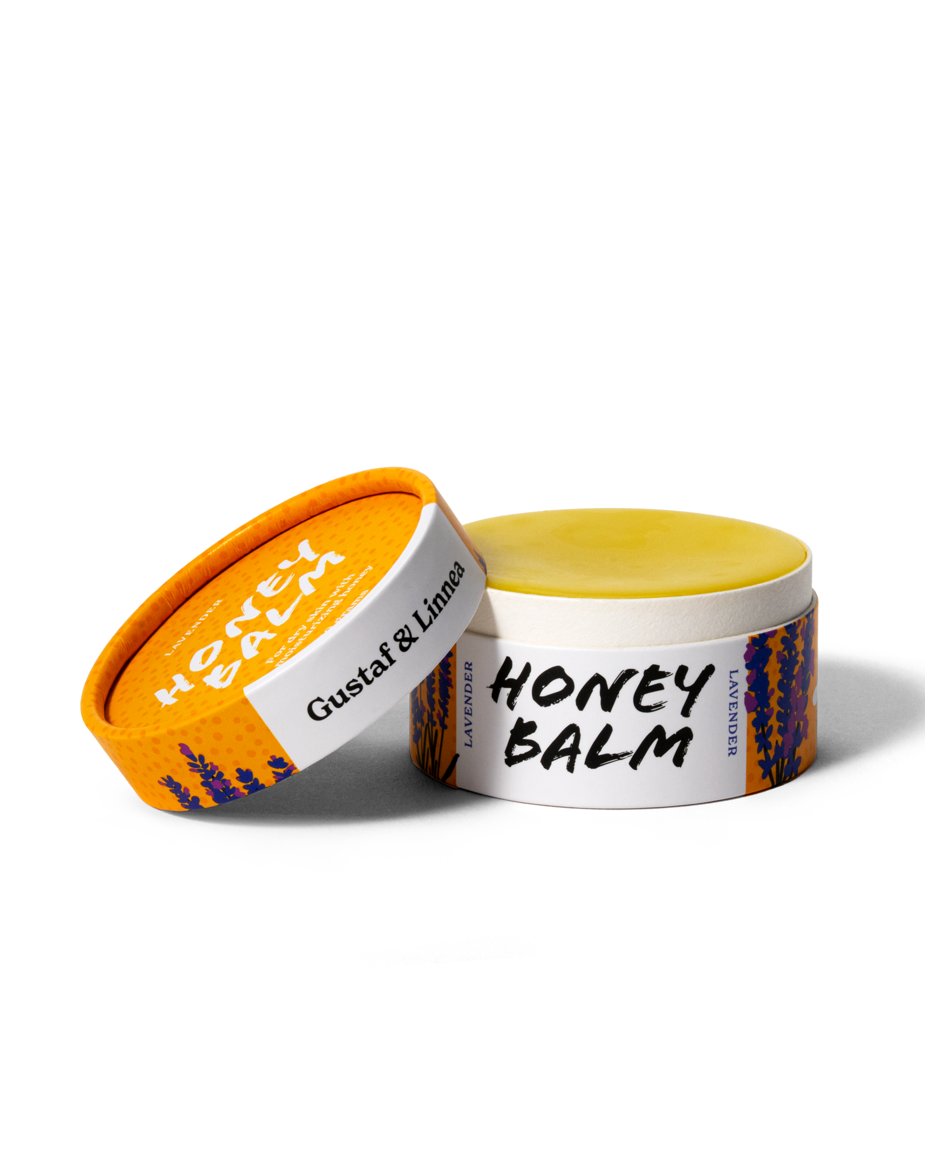 Öppen burk med honungssalva från Gustaf & Linnea, mjuk gul salva synlig