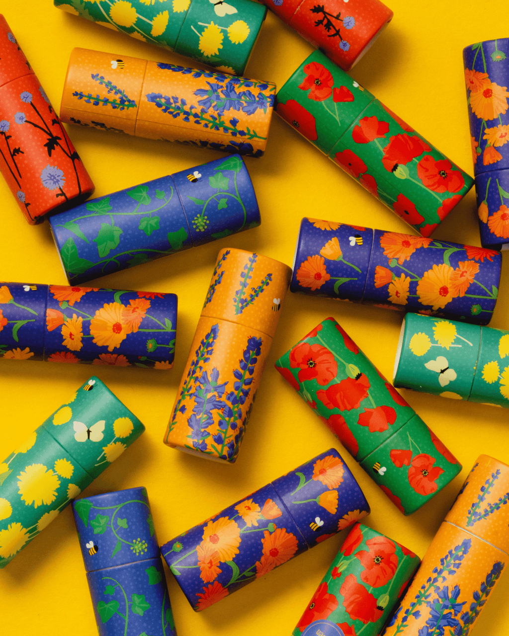 Lip balm floral motif against a yellow background.