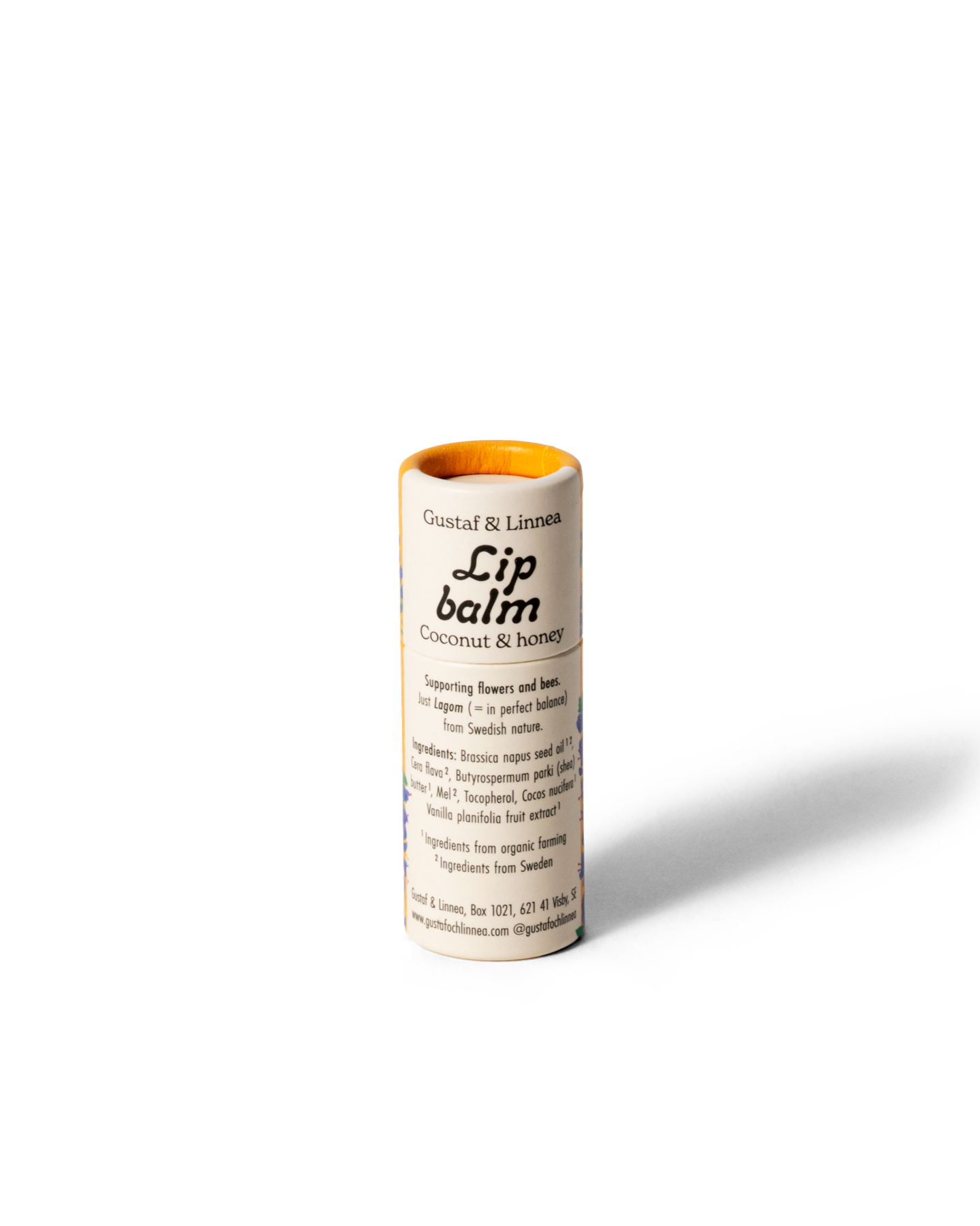 Baksida av läppcerat Kokos & Honung med ingredienslista och hållbar förpackning