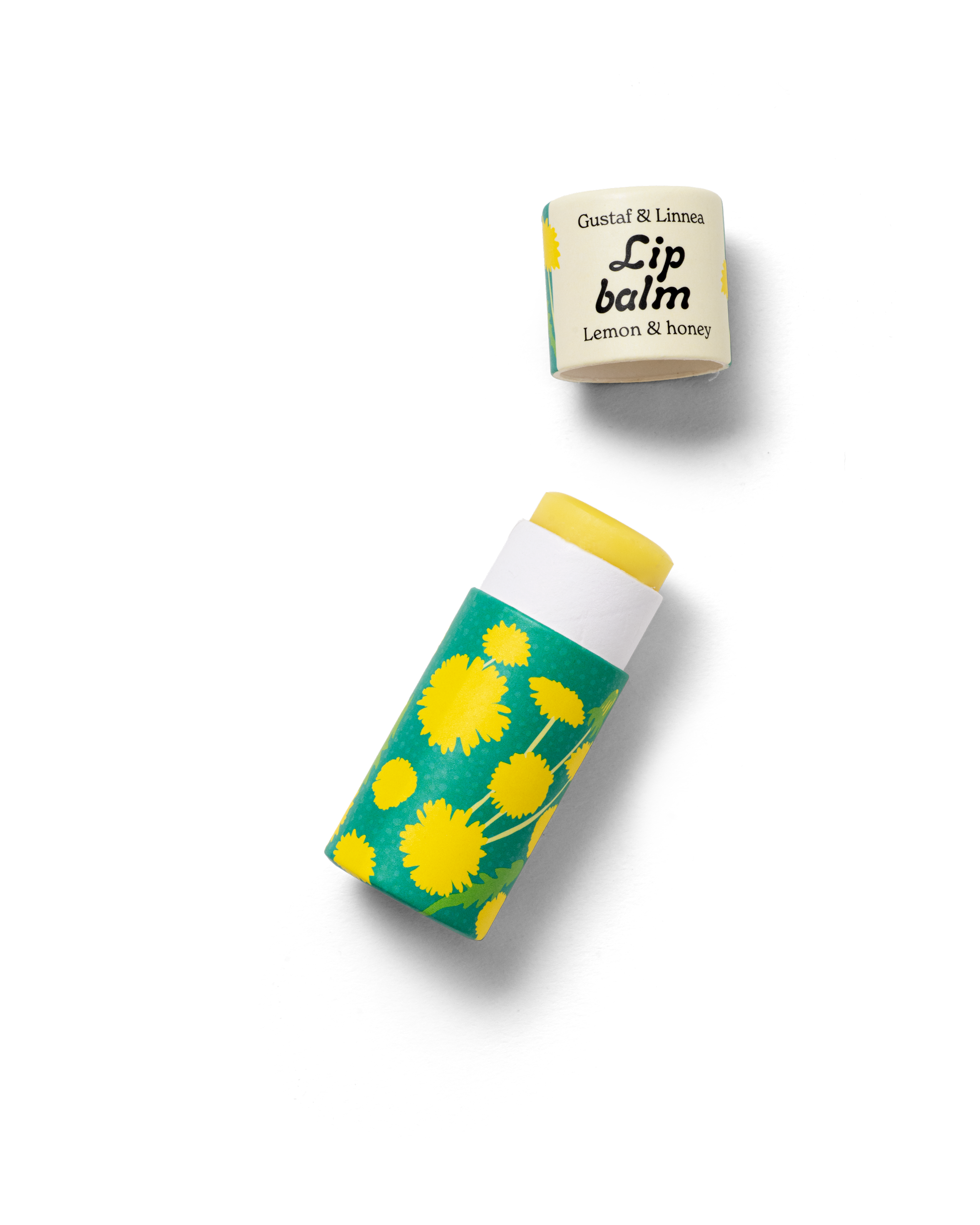 Läppcerat med citron och honung, öppnad förpackning med maskrosmönster