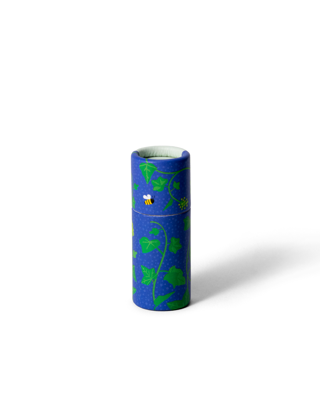 Handgjort läppcerat med murgrönemotiv i blått och grönt.