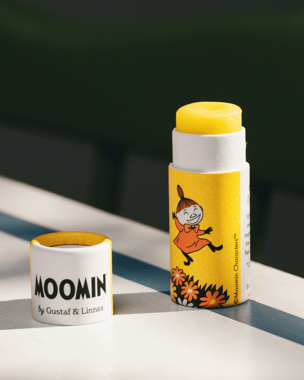 Lip balm lemon flavor and Little My motif.