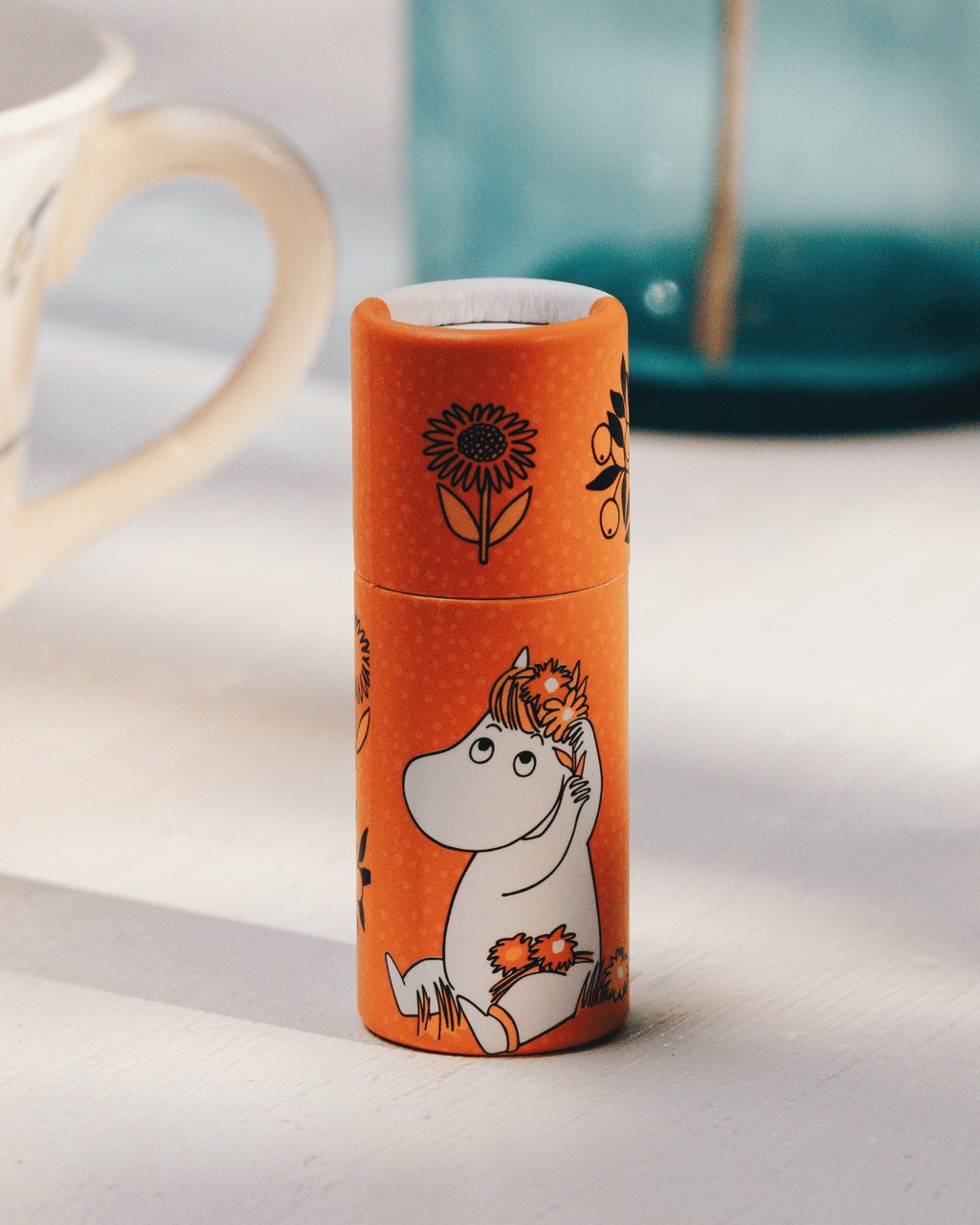 Läppcerat med motiv av snorkfröken och smak av appelsin.