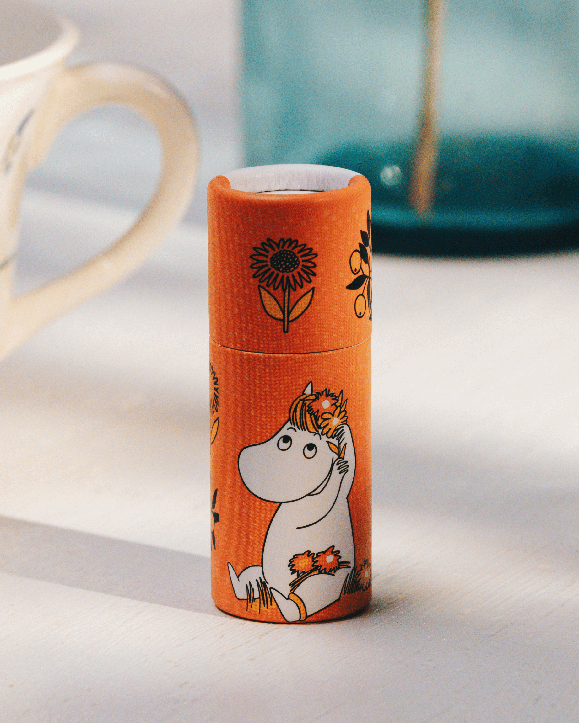 Läppcerat med motiv av snorkfröken och smak av appelsin.