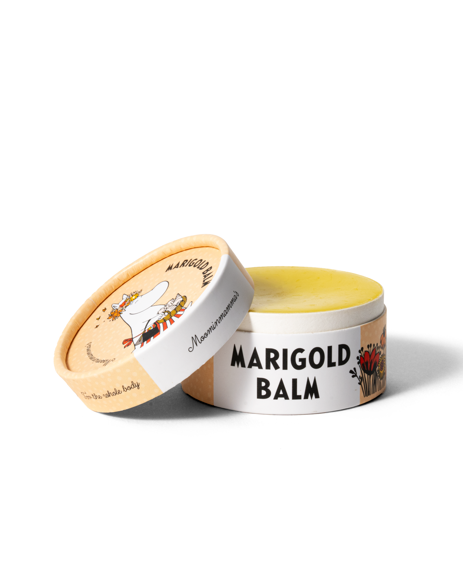 Öppen ringblomssalva med Muminmamma-motiv som visar salvens konsistens.